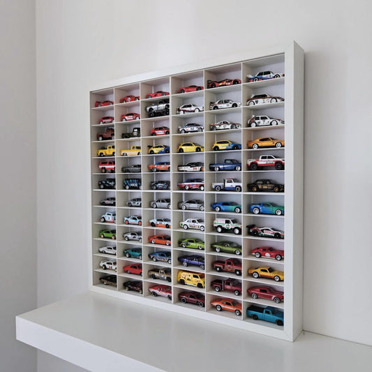 Angled view of Sannahed frame with Hot Wheels display insert and diecast car collection