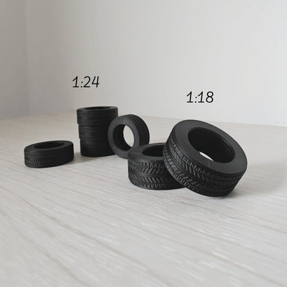 Grouped mini tires in different sizes for model car and garage dioramas