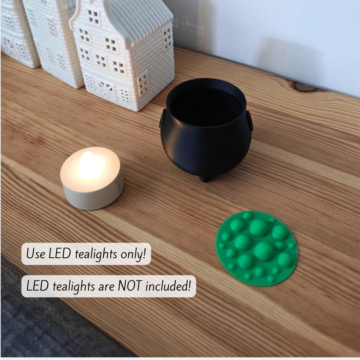 LED tealight and cauldron placed beside each other with “Use LED tealights only” text overlay (LED not included).