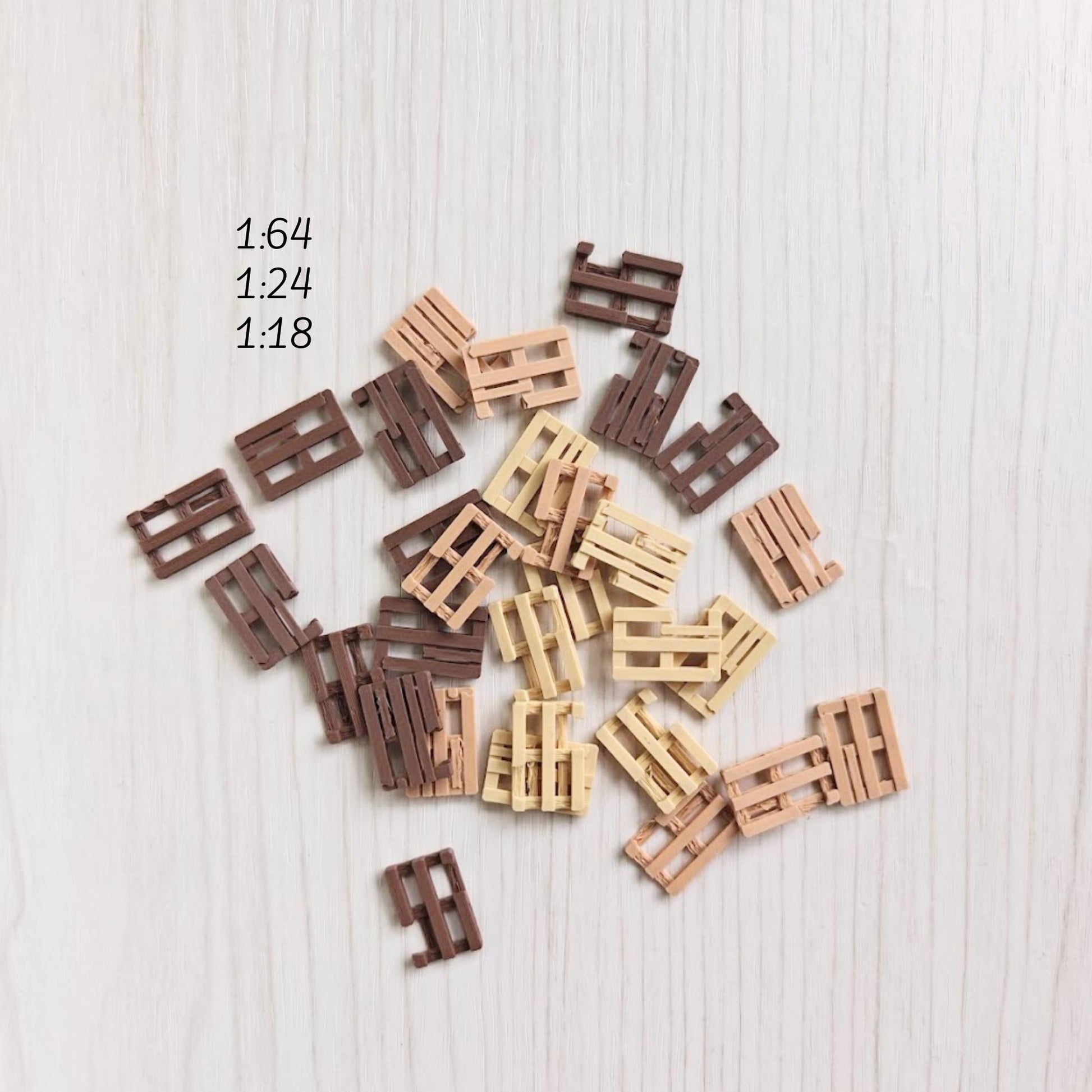 Miniature broken pallets scattered on surface