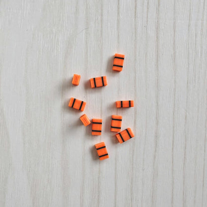 Miniature orange medical bags in 1/64 scale for fire truck diorama accessories