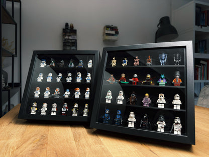 Black display frames with grid inserts showcasing LEGO minifigure collections