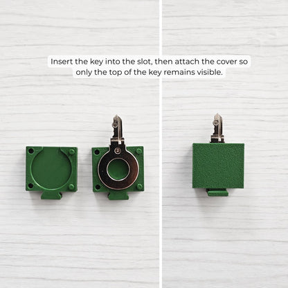 Step-by-step view of the key cover assembly, showing the cover piece, key inserted into the slot, and finished covered key.