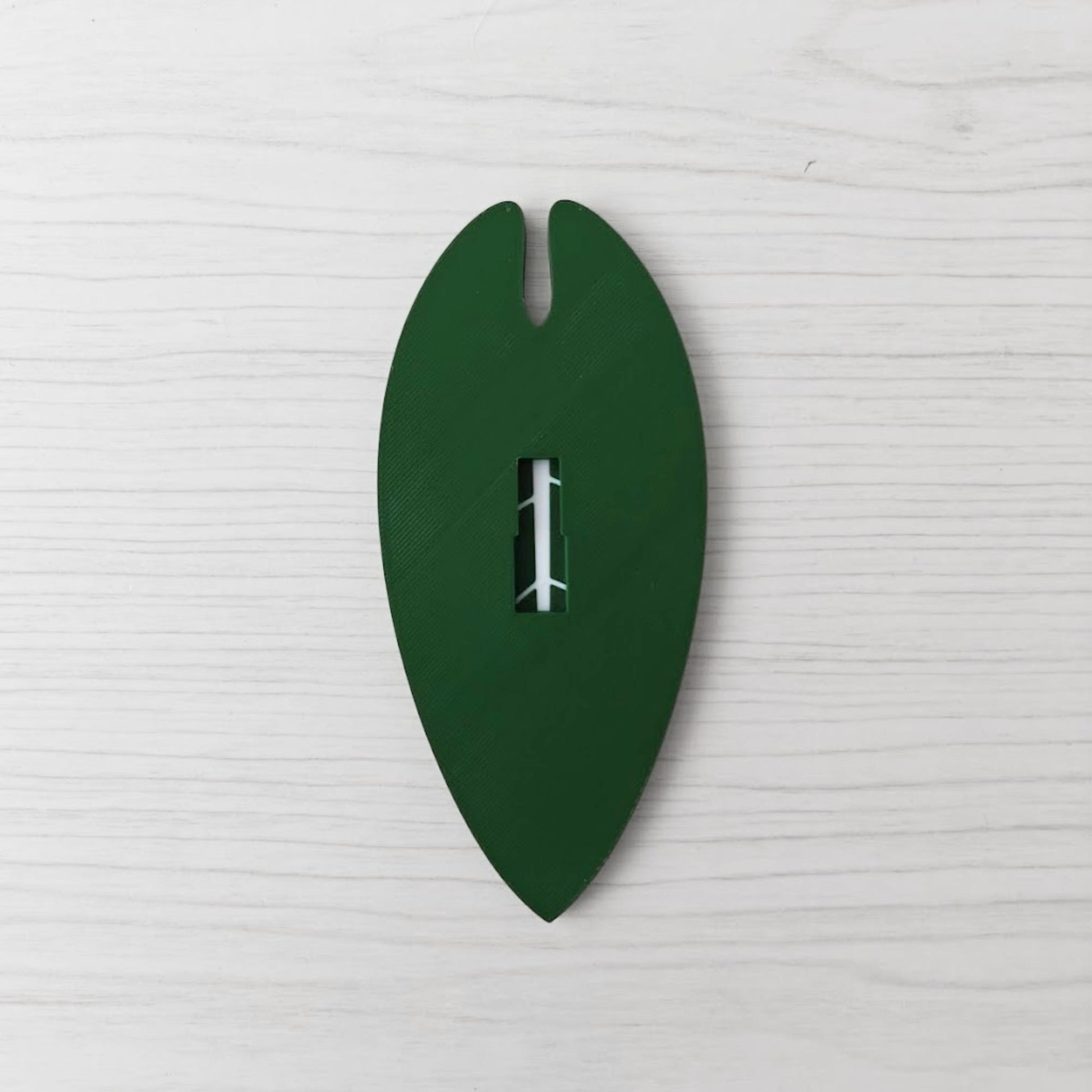 Back view of the Anthurium Warocqueanum handle showing the key slot opening.