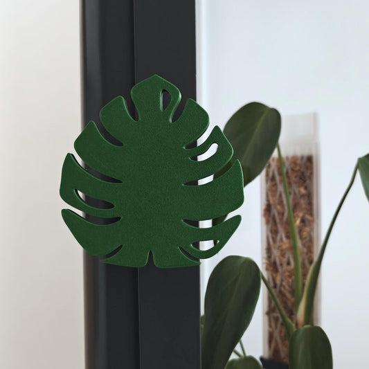 Monstera leaf shaped handle mounted on Ikea Fabrikor cabinet