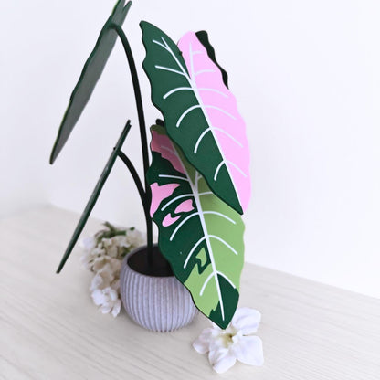 Angled side view of the Alocasia Chantrieri Pink coaster set arranged in the holder.