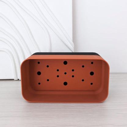 Front view of the rectangular inner pot showing the drainage holes inside.