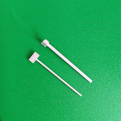 1:64 scale pole-mounted scene lights on green background