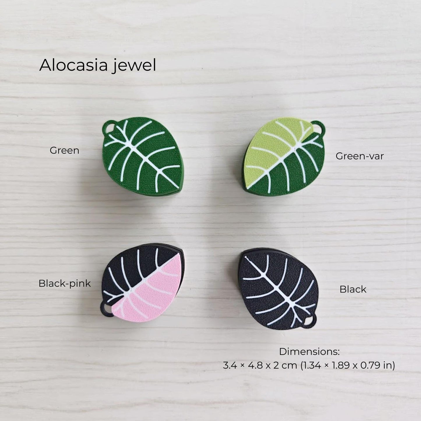Alocasia jewel leaf clicker fidget in green and black pink variations