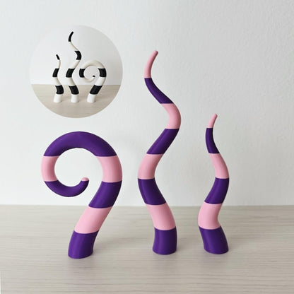 Beetlejuice sandworm plant stakes purple and black striped decor set on wooden surface