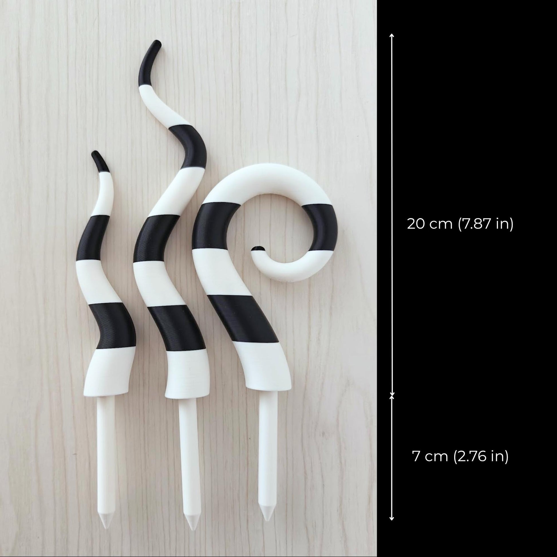 Beetlejuice sandworm stakes with dimensions shown