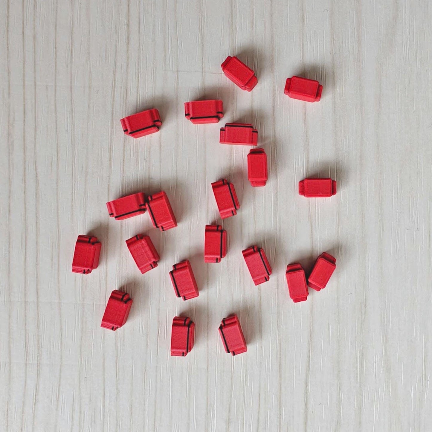 Miniature red medical bags in 1/64 scale for ambulance diorama accessories