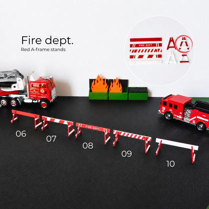 Fire dept roadblock barriers with red A-frame stands and fire truck scene in 1:64 scale