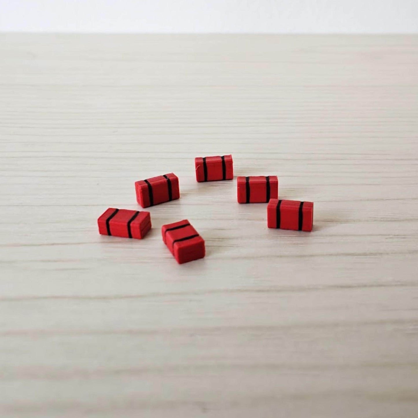 Small red medical bags in 1/64 scale