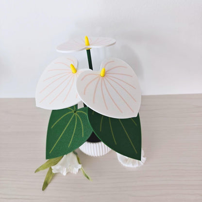 White Anthurium coaster plant displayed as a decorative 3D printed plant with green leaves and white flower coasters.