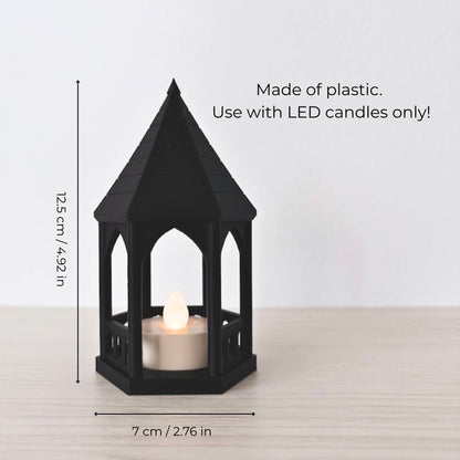 Dimensions Graphic: A sizing guide showing the black gazebo tealight holder with text indicating it is 12.5 cm (4.92 inches) tall and 7 cm (2.76 inches) wide. Additional text reads "Made of plastic. Use with LED candles only!".