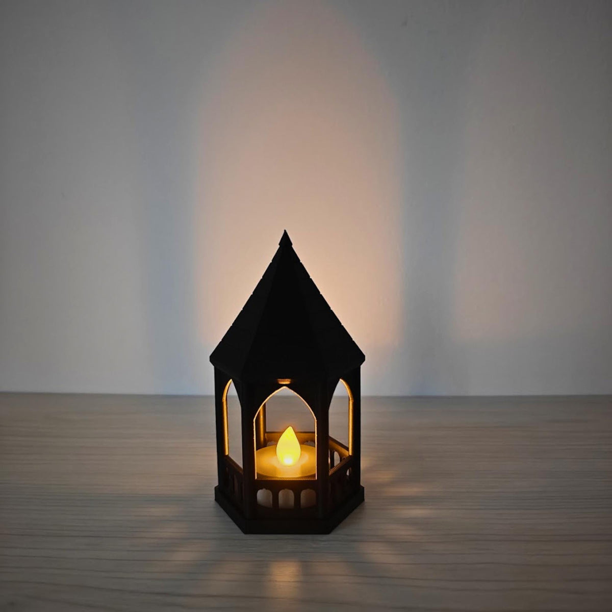 Gothic gazebo LED tealight holder at night