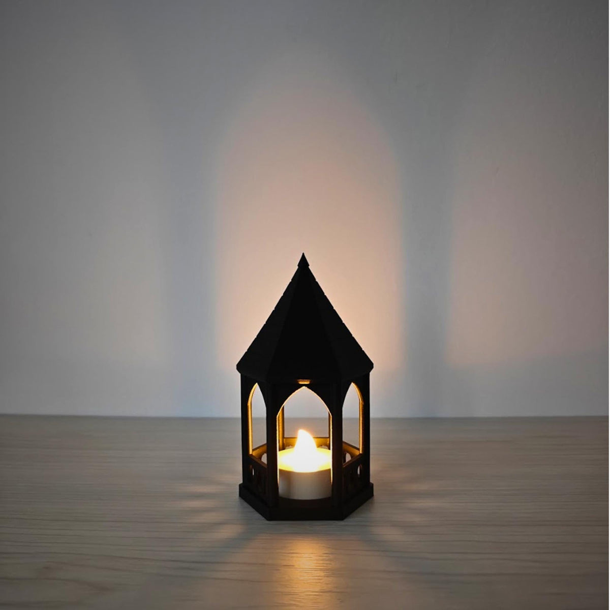 Gothic gazebo LED tealight holder at night