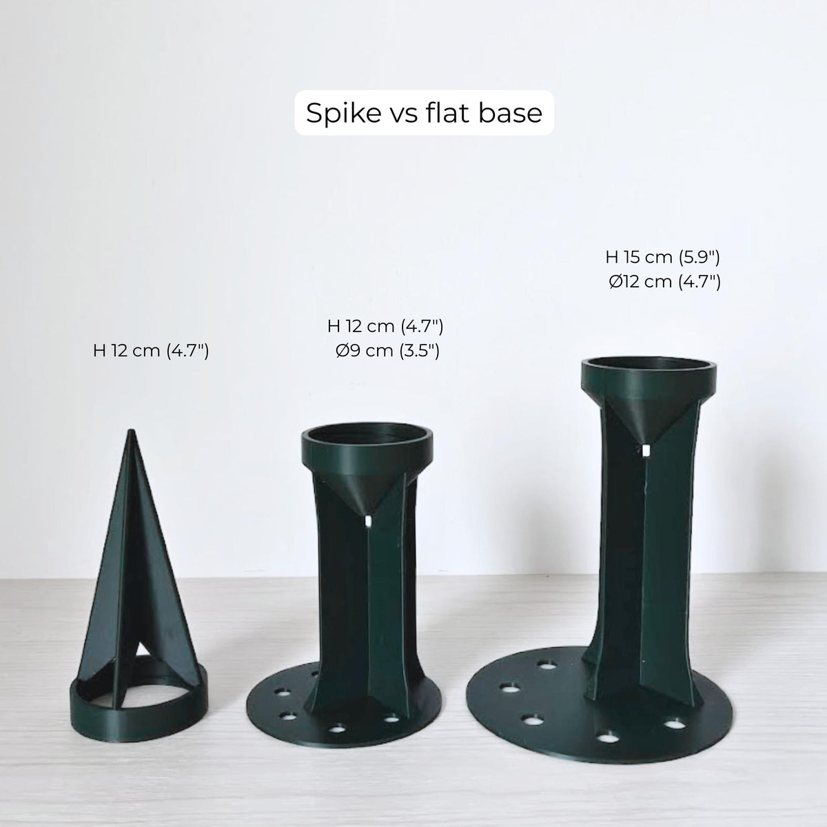 Spike and base options for securing moss pole in pots The first is a spike, 12 cm (4.7") tall. The second has a flat base, 12 cm (4.7") tall and 9 cm (3.5") in diameter. The third is 15 cm (5.9") tall and 12 cm (4.7") in diameter.