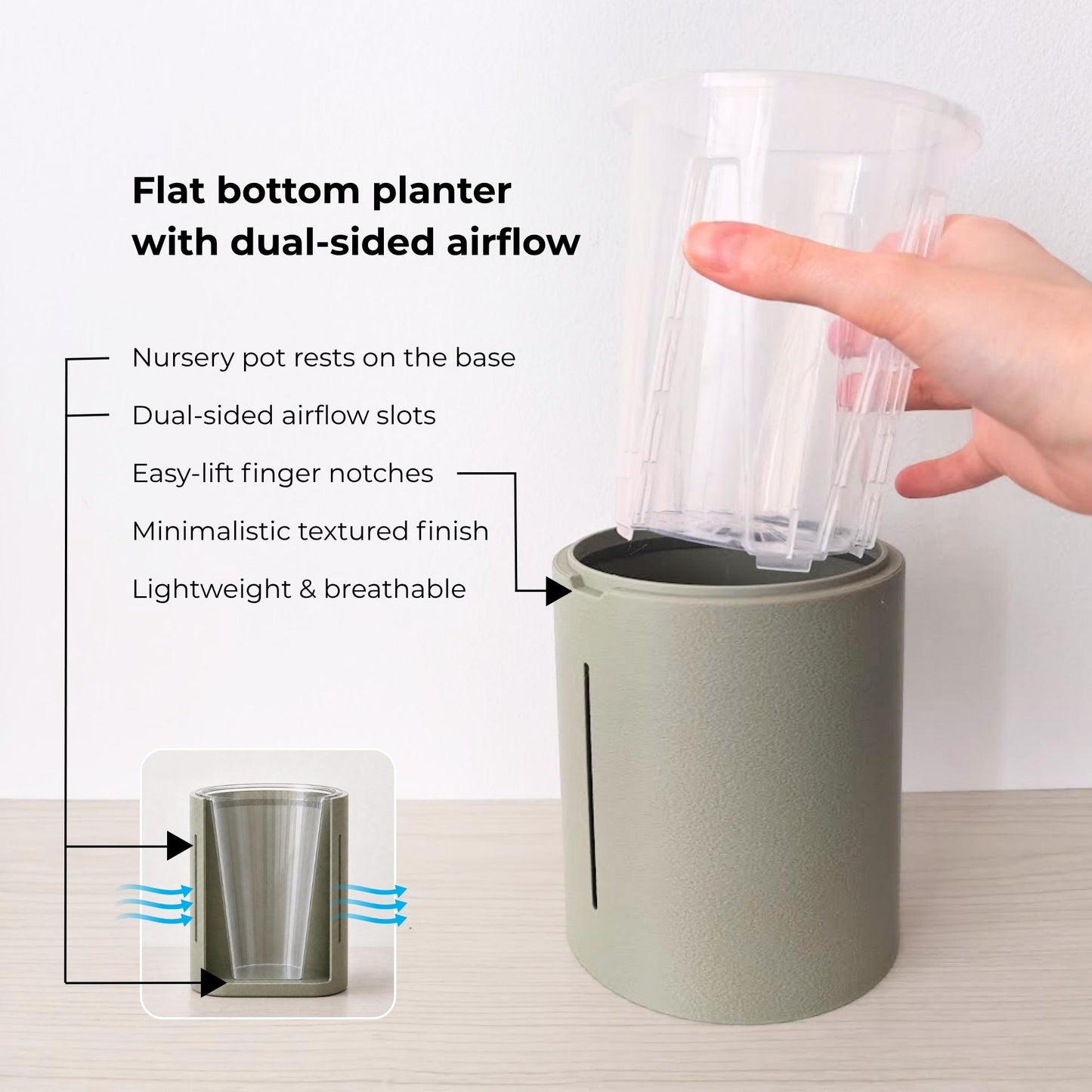 Sage flat-bottom planter with airflow openings and a clear nursery pot resting directly on the solid base.
