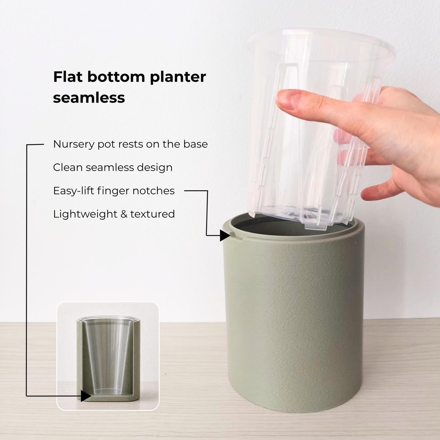 Sage flat-bottom planter with seamless solid sides and a clear nursery pot resting directly on the solid base.