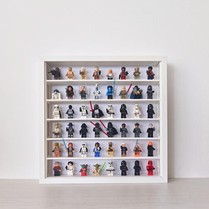 White SANNAHED 35 × 35 cm frame with a six-row display grid holding 48 collectible minifigures