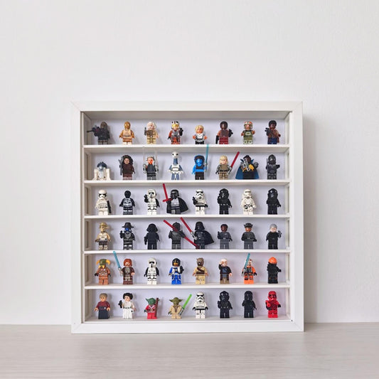 White SANNAHED 35 × 35 cm frame with a six-row display grid holding 48 collectible minifigures