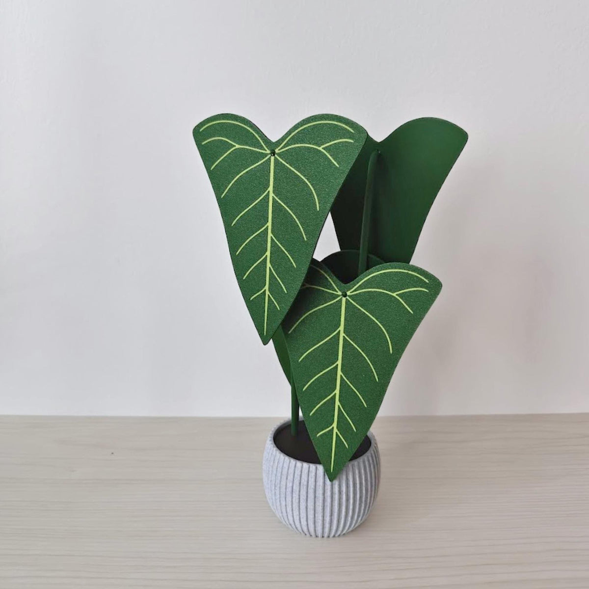 Assembled Anthurium Delta Force coaster set displayed as a decorative green potted plant