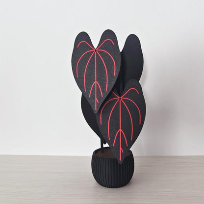 Front view of the Anthurium Queen of Hearts coaster holder arranged as a decorative tropical plant.