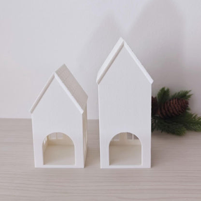 Rear view of small and tall white house LED tealight shades