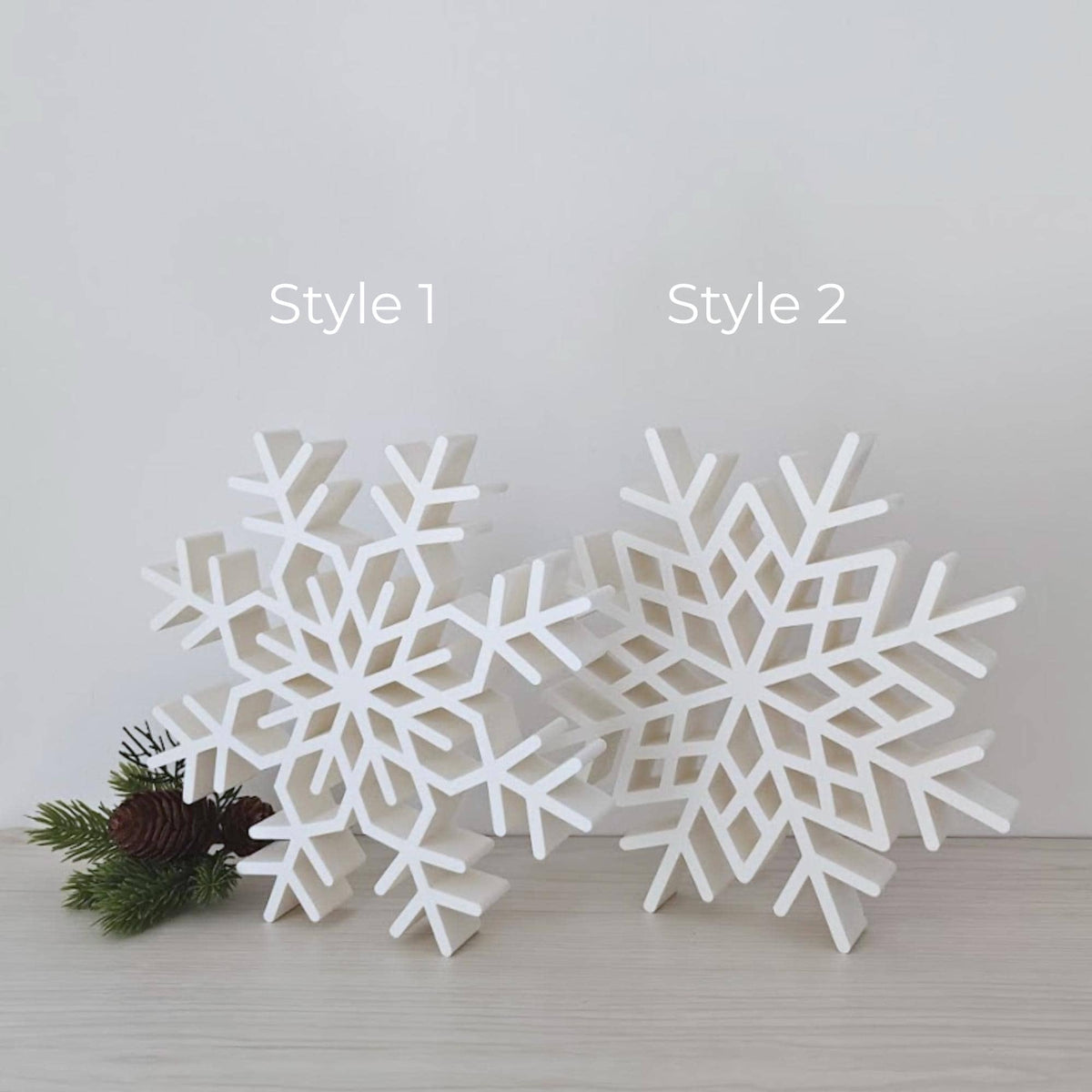 Style 1 and Style 2 large snowflake decorations displayed side by side