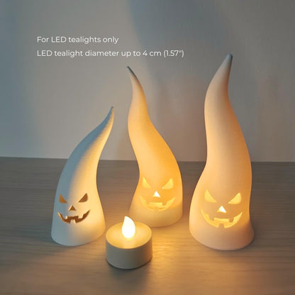 Ghost tealight covers shown with an LED tealight, suitable for LED candles up to 4 cm (1.57 in) in diameter.