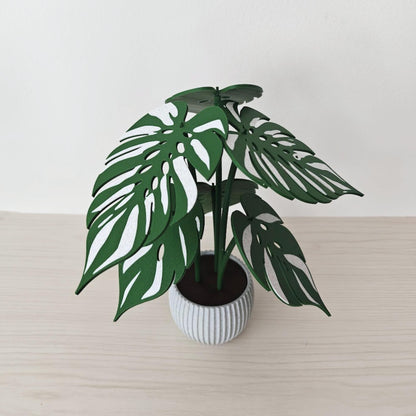 Angled view of Monstera Devil Monster coaster set assembled as a decorative plant