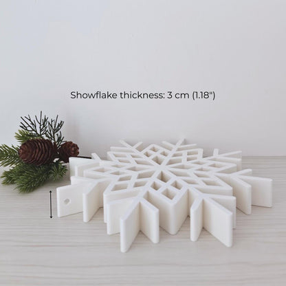 Large snowflake decoration shown from the side with 3 cm thick sculptural profile